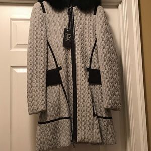 Tricot Chic gray with fur trim.